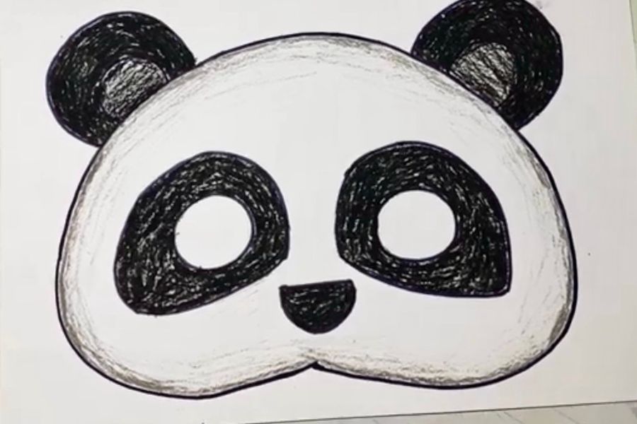 Mặt nạ hình chú gấu panda dễ thương.